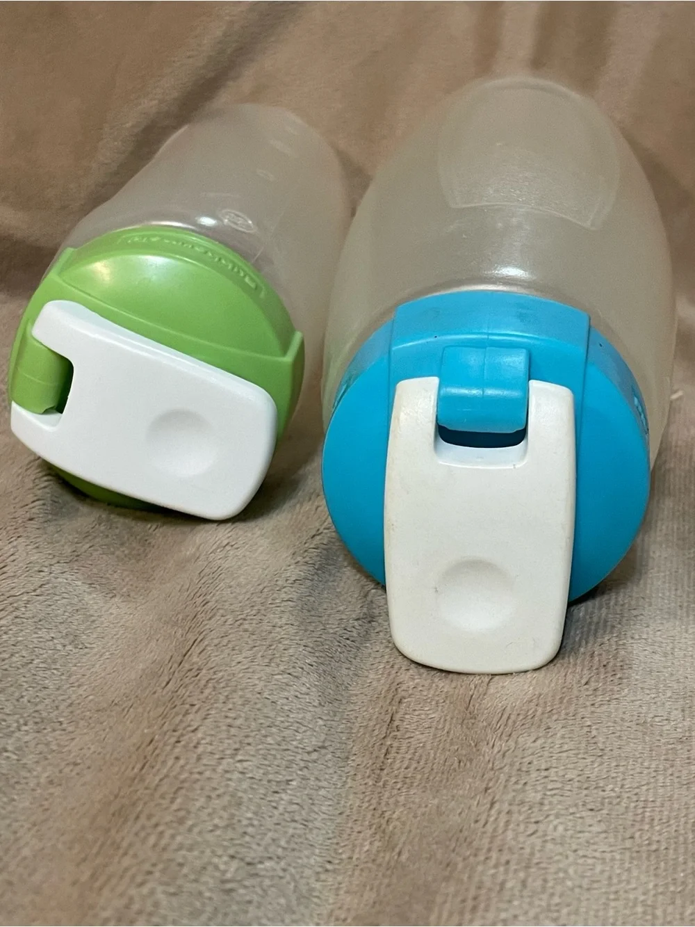 Tupperware Set of Clear Storage Bottles with Green and Blue Lids